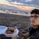 Enjoying Nasi Campur on the beach