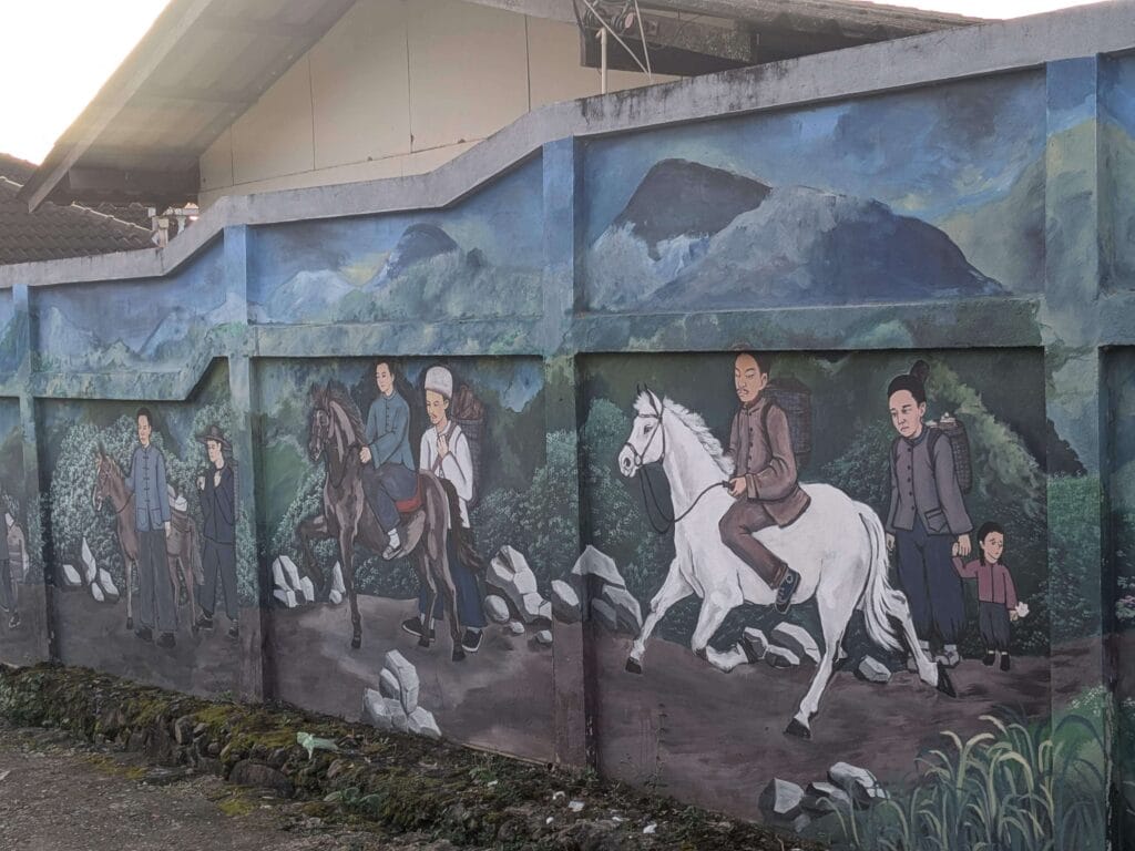 Wall painting showing Chinese refugees fleeing Yunnan to Thailand after the 1950s civil war